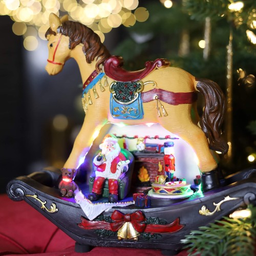 Новогодняя статуэтка ZELENA Конь-качалка Мастерская Санты с LED Д25