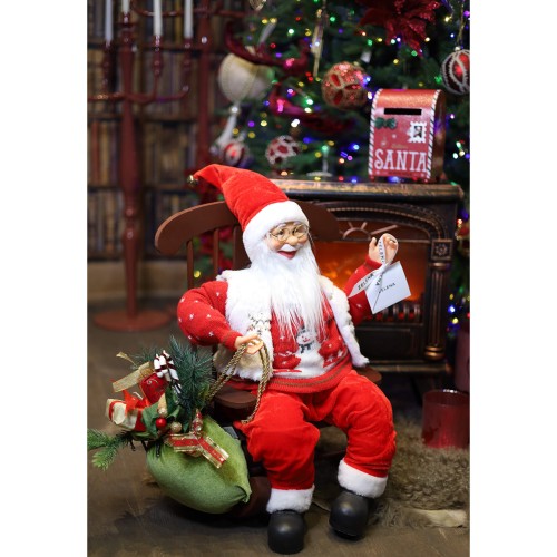 Новогодняя статуэтка ZELENA Санта в кресле-качалке LED В54